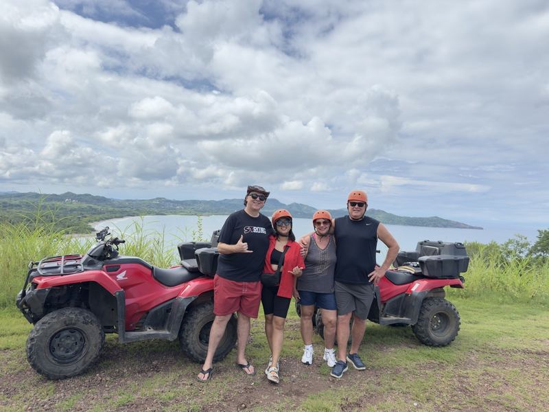 My family and I on ATVs overlooking the Costa Rica coast